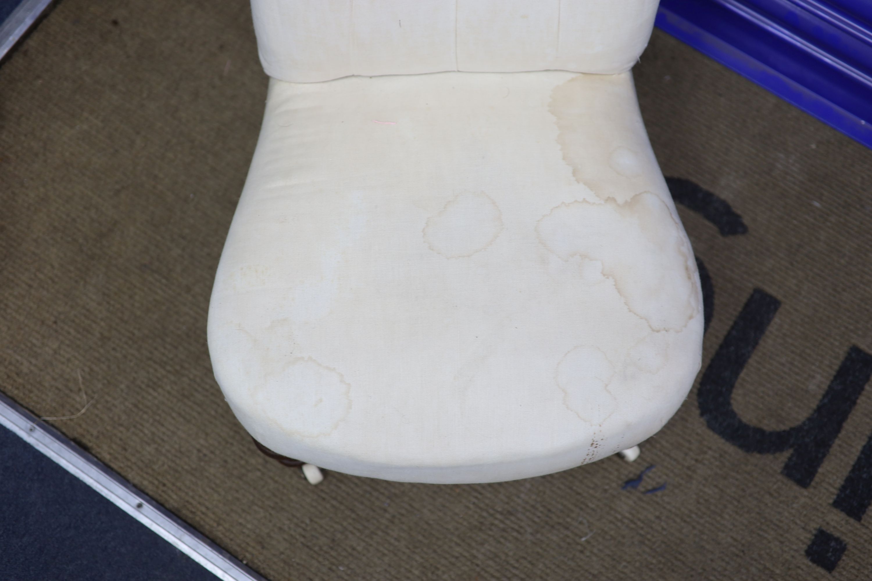 A Victorian walnut framed button back nursing chair, height 79cms width 47cms